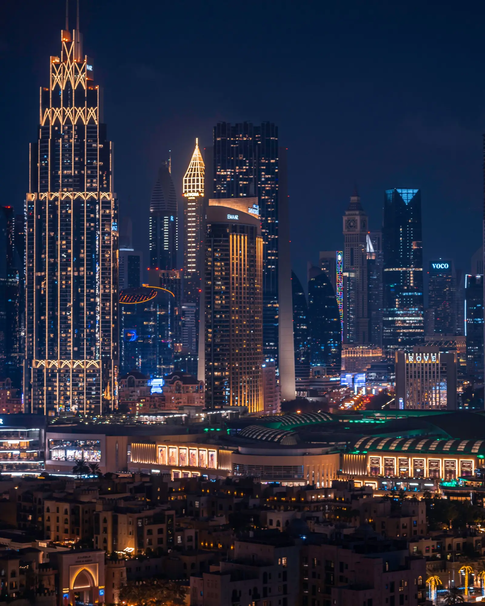 Dubai skyline at night seen across the water.
