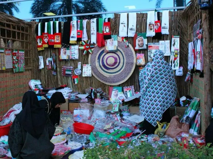 Productive families craft stall displaying handmade Emirati goods.
